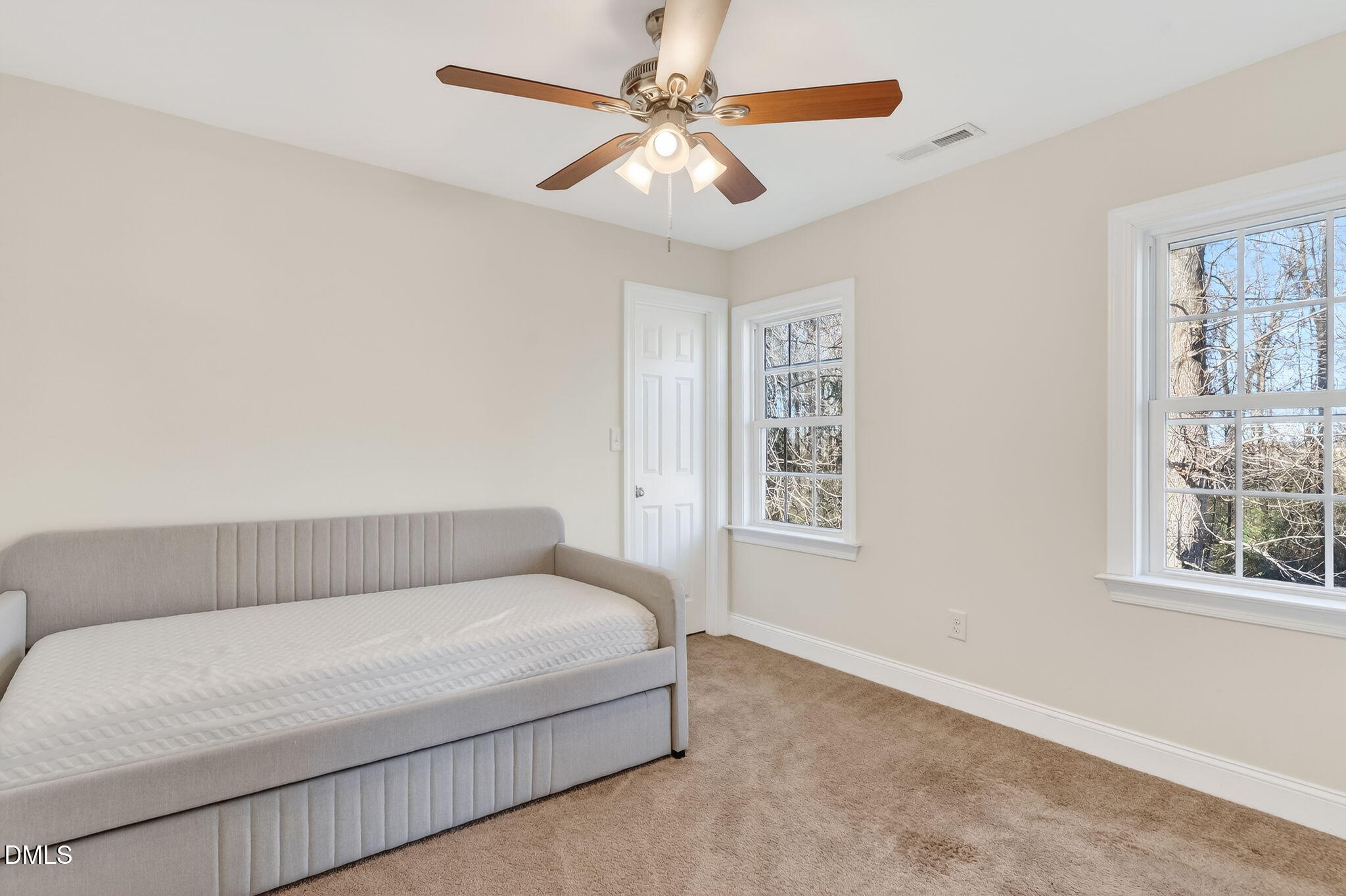 27 Duchess Court Angier, NC 27501 - Photo 19 of 50 a bedroom with a bed and a window