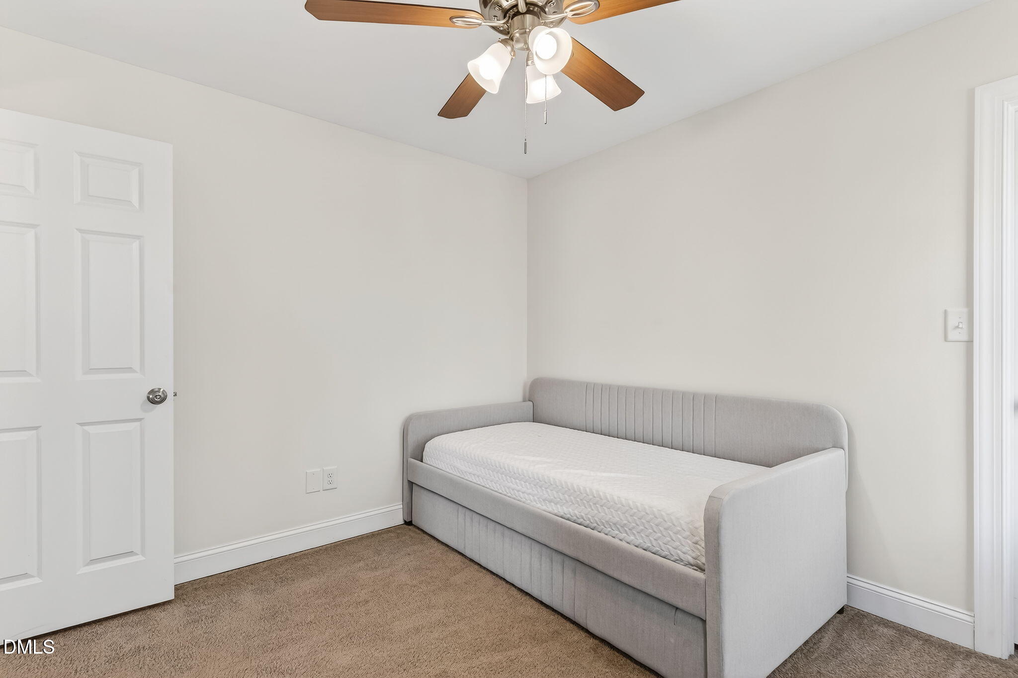 27 Duchess Court Angier, NC 27501 - Photo 20 of 50 a bedroom with a bed and ceiling fan