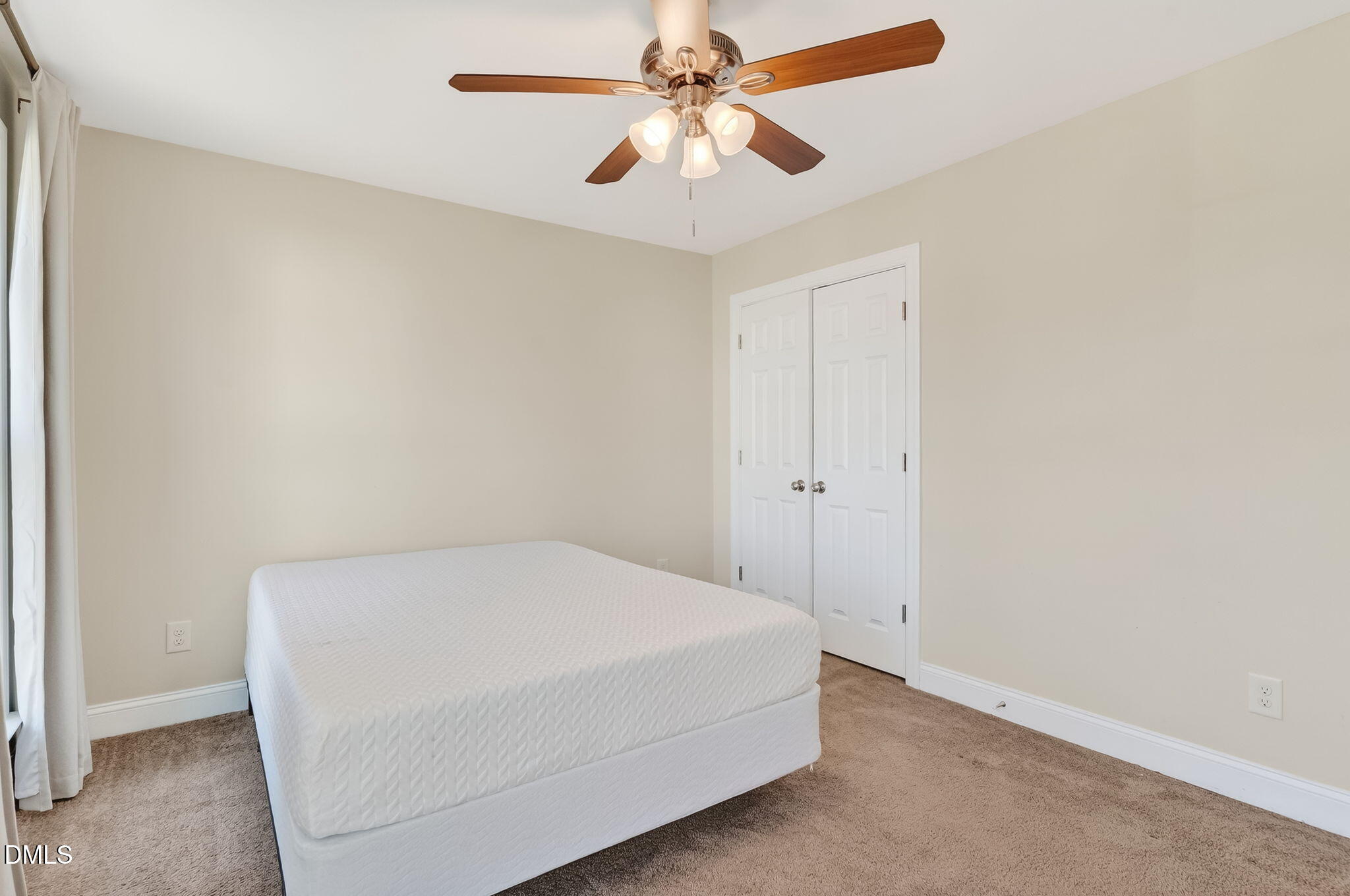 27 Duchess Court Angier, NC 27501 - Photo 23 of 50 a room with a chandelier fan and windows