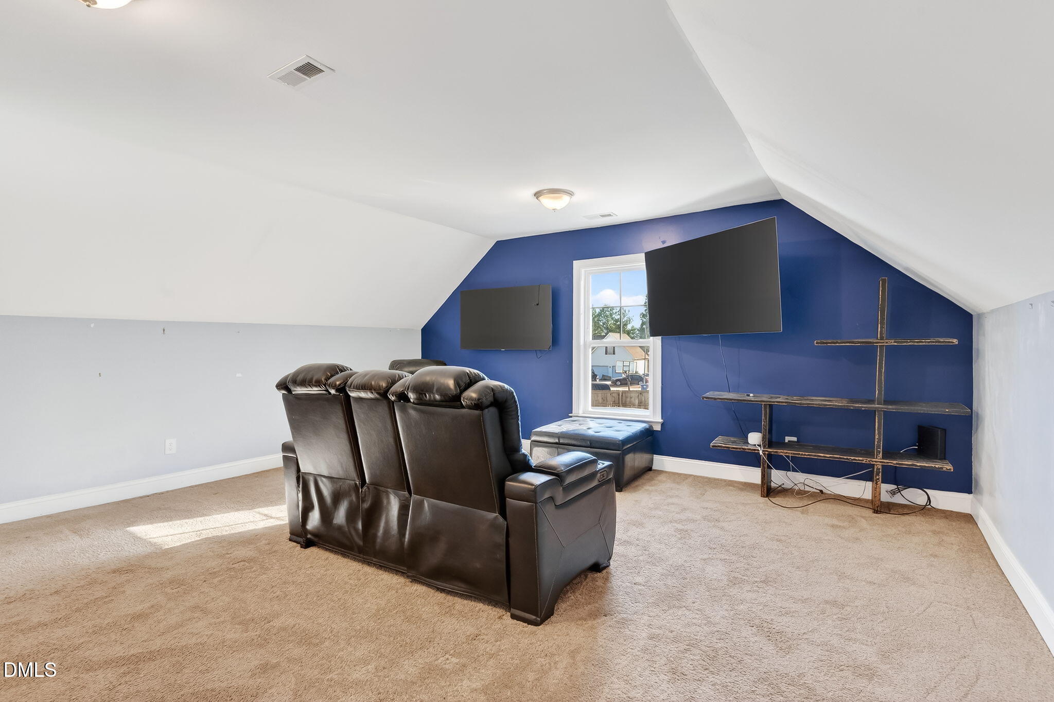 27 Duchess Court Angier, NC 27501 - Photo 26 of 50 a living room with furniture and a flat screen tv