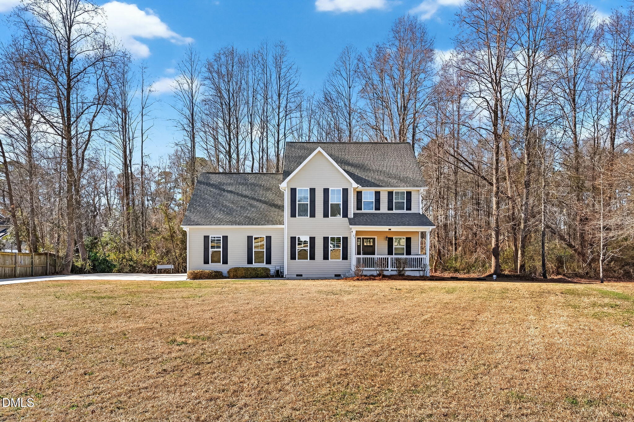 27 Duchess Court Angier, NC 27501 - Photo 2 of 50 a front view of residential houses with yard and trees