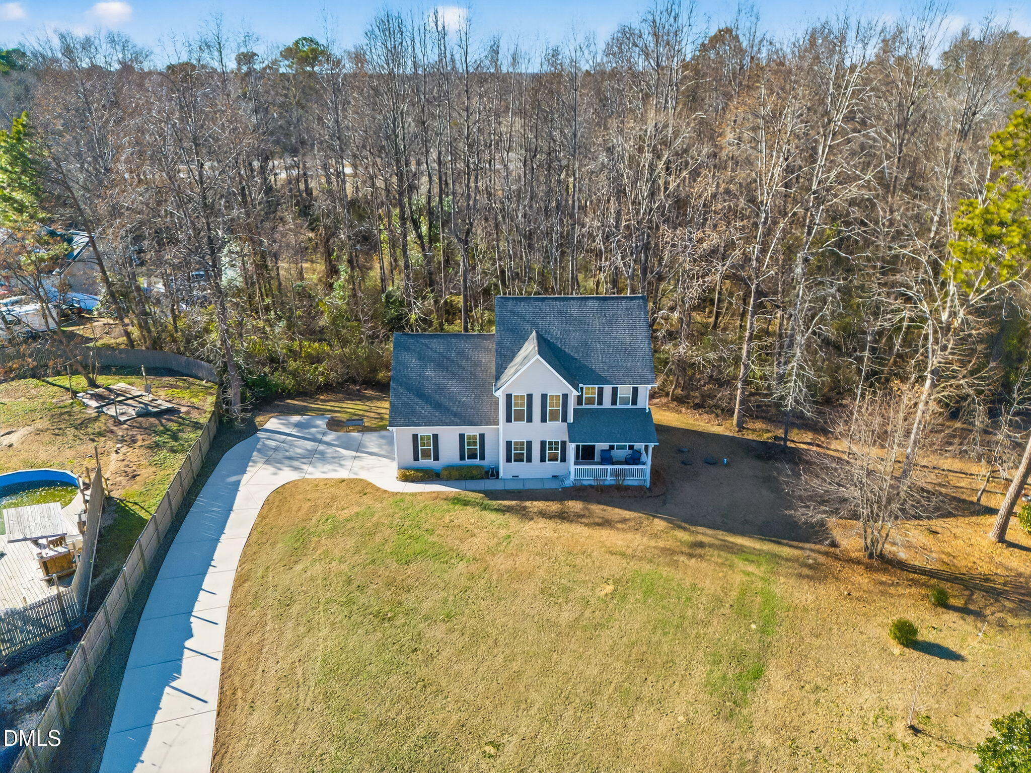 27 Duchess Court Angier, NC 27501 - Photo 37 of 50 a view of a house with a large pool and a yard