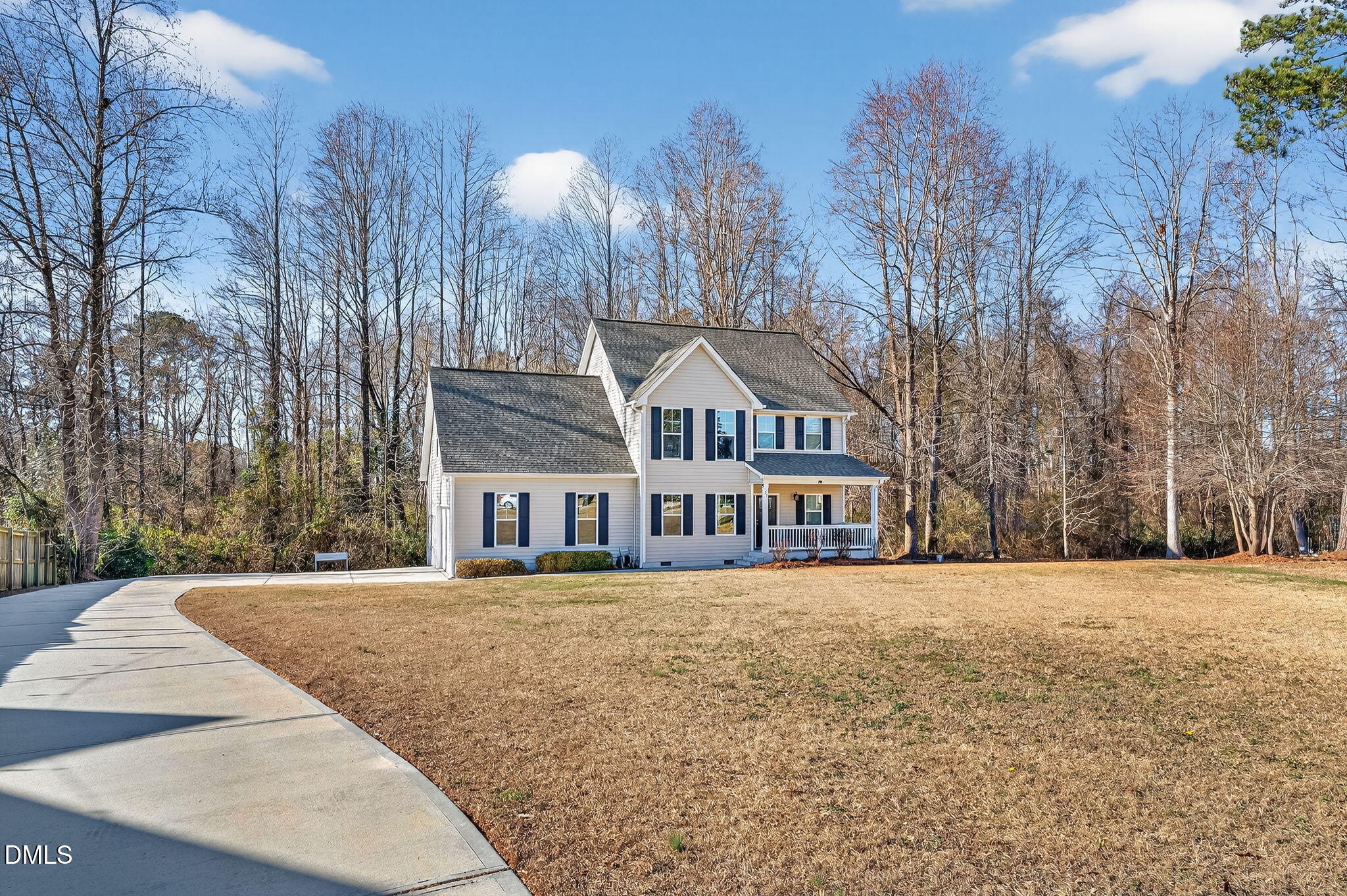 27 Duchess Court Angier, NC 27501 - Photo 3 of 50 a view of a white house with a yard with trees