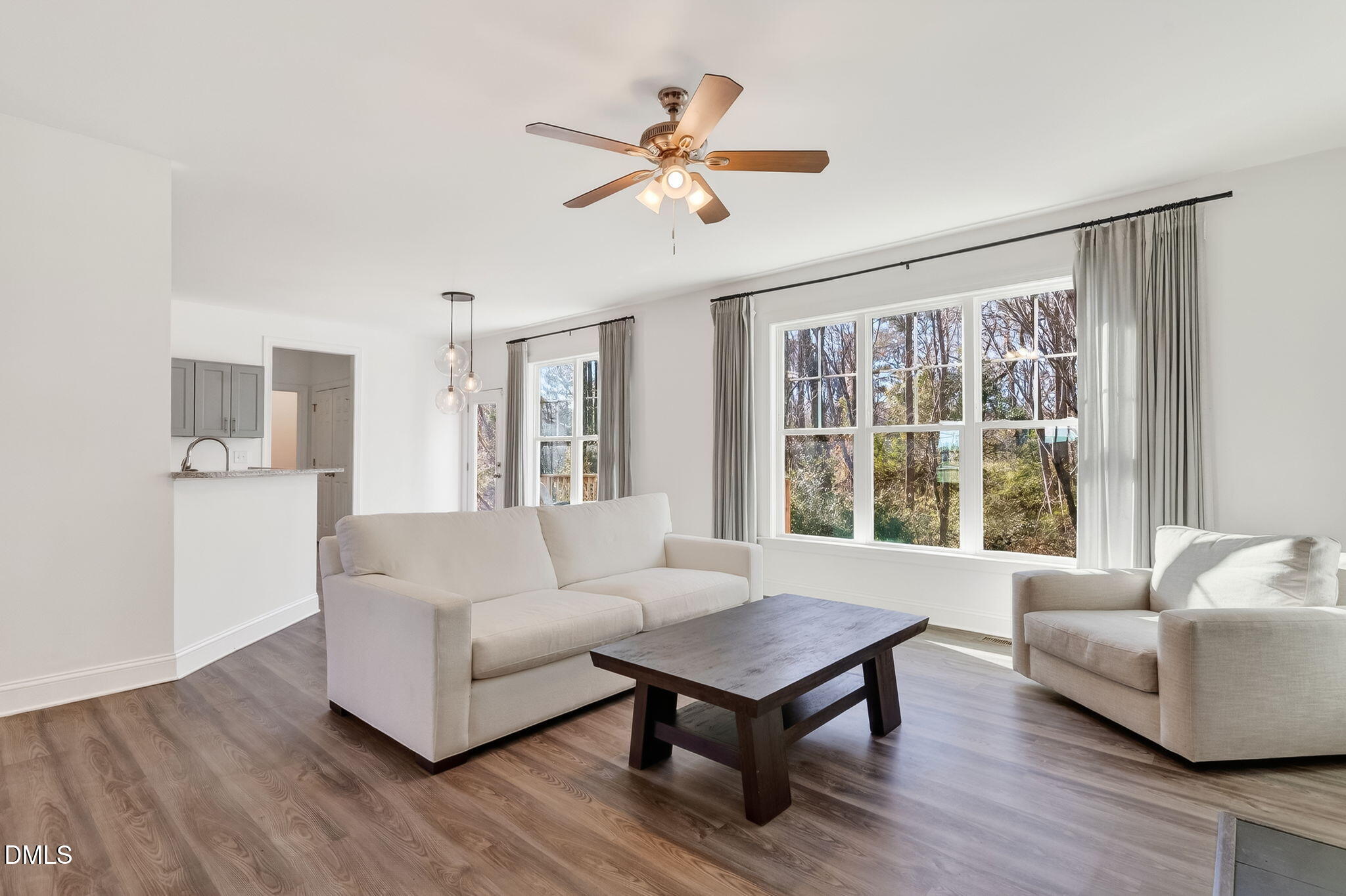 27 Duchess Court Angier, NC 27501 - Photo 7 of 50 a living room with furniture and a large window