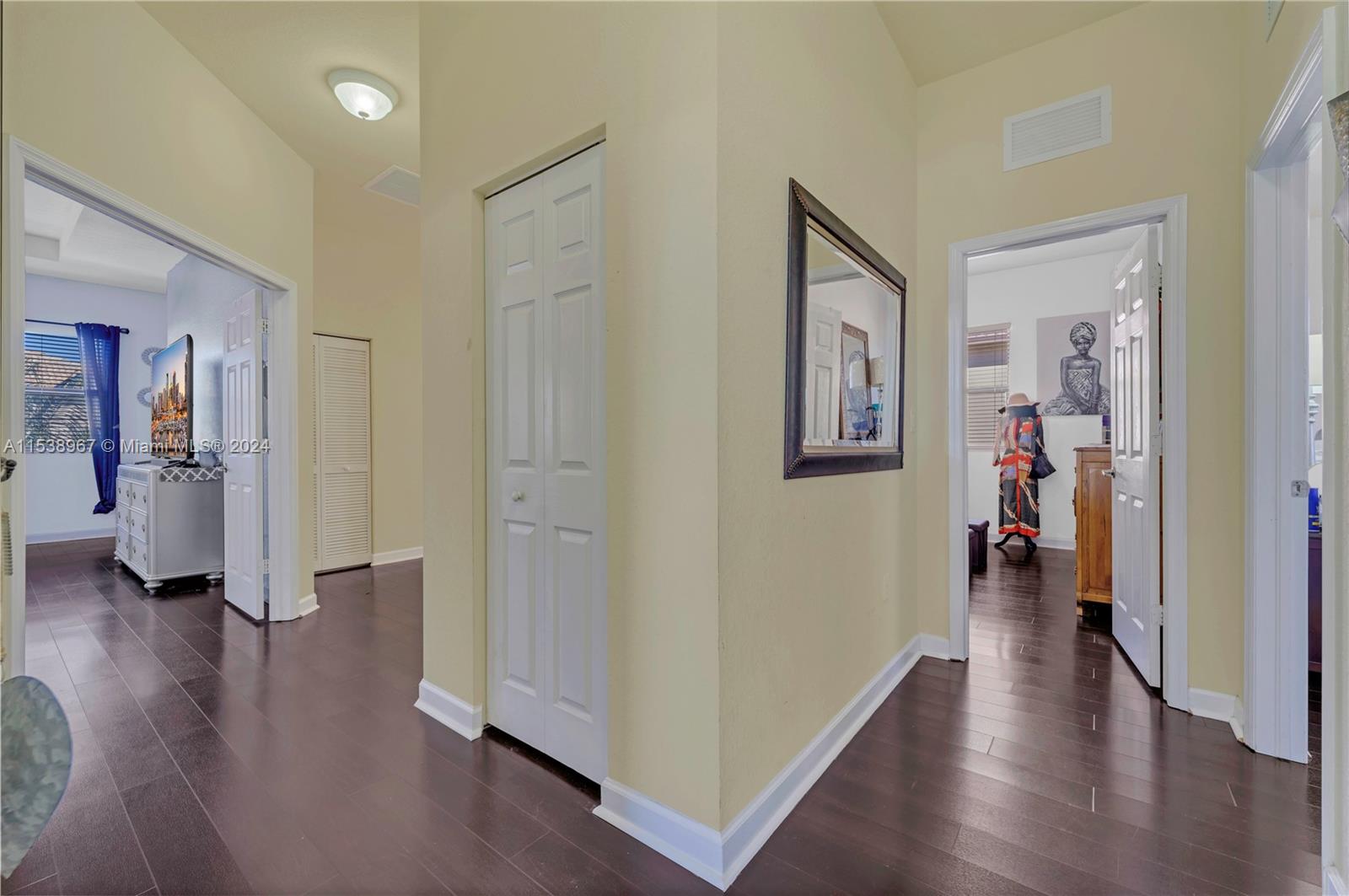 24084 Southwest 113th Path Homestead, FL 33032 - Photo 20 of 37 a view of a hallway view with wooden floor and workspace
