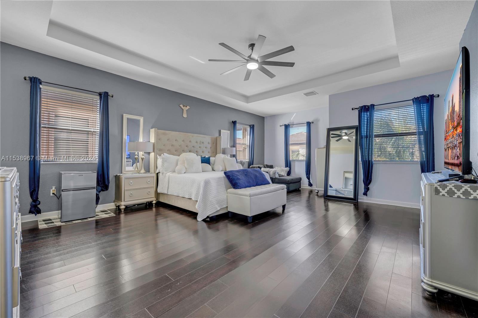 24084 Southwest 113th Path Homestead, FL 33032 - Photo 21 of 37 a bedroom with a bed furniture and a large window