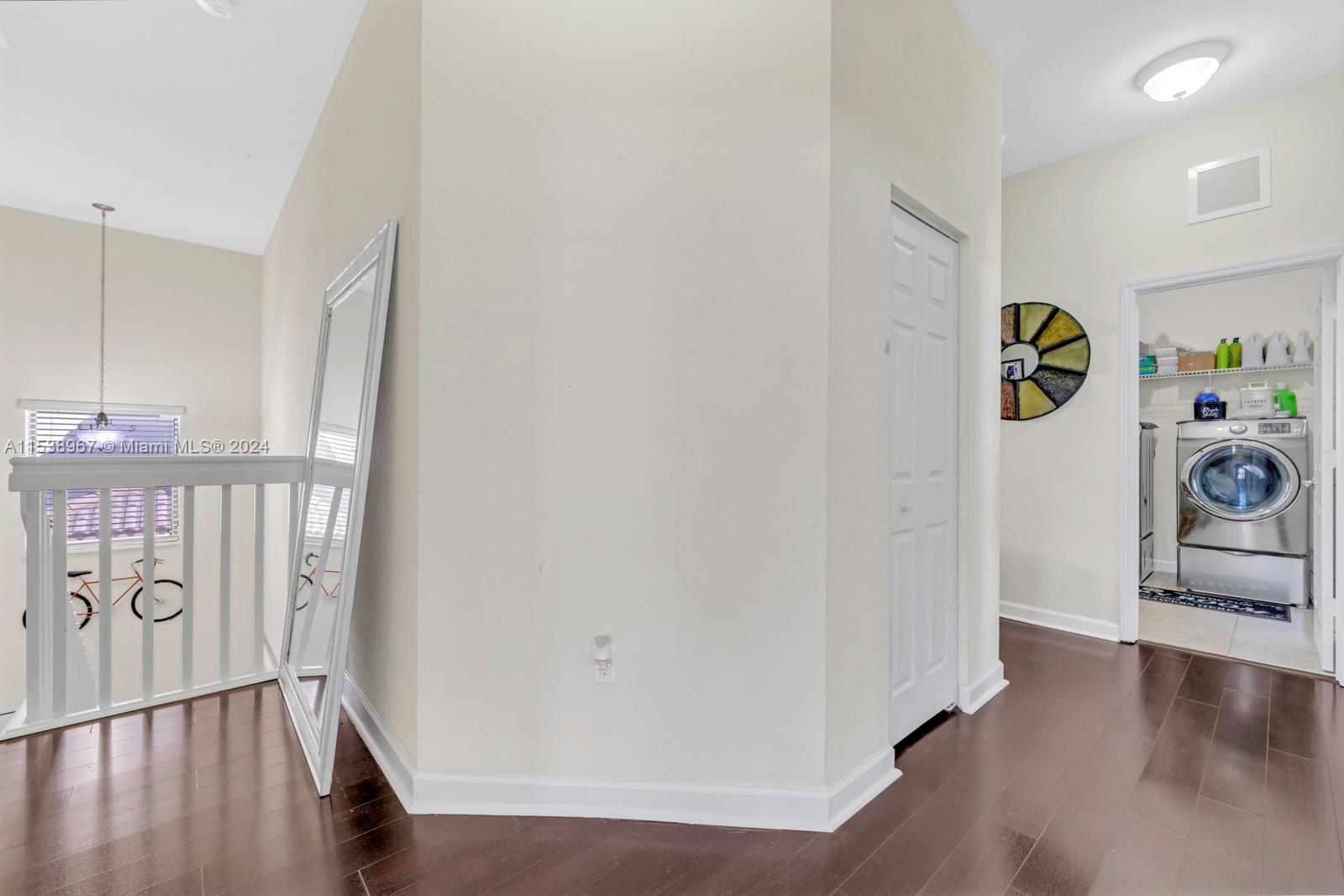 24084 Southwest 113th Path Homestead, FL 33032 - Photo 27 of 37 a view of an entryway with wooden floor