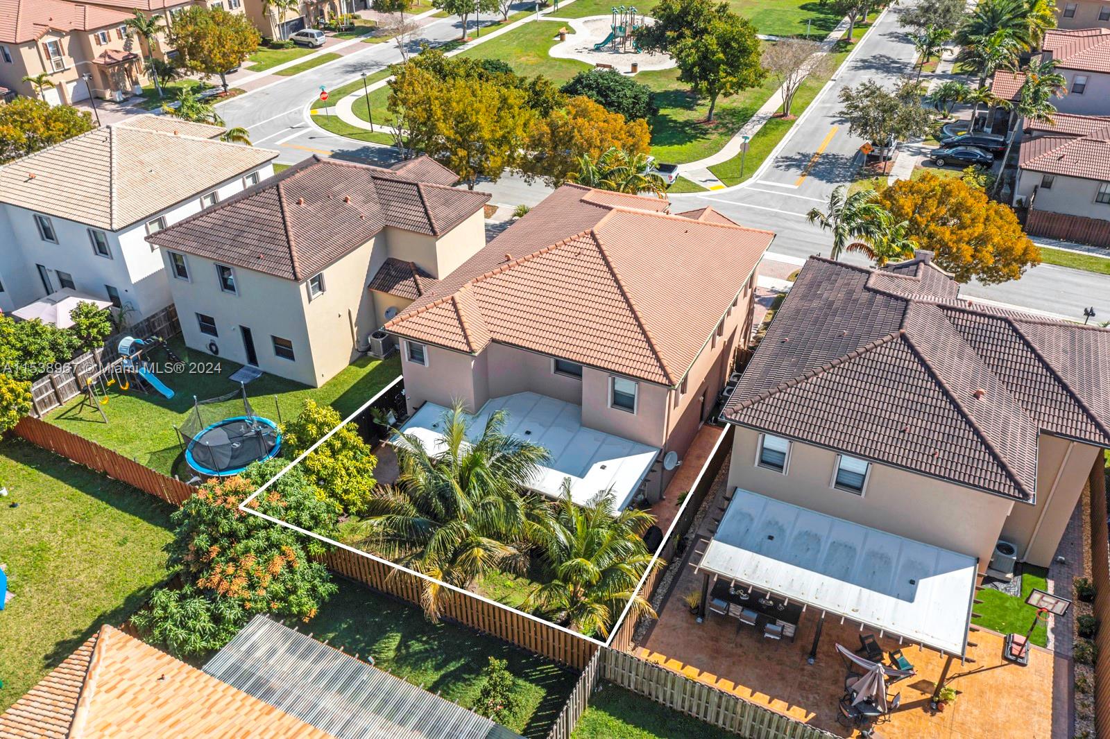 24084 Southwest 113th Path Homestead, FL 33032 - Photo 32 of 37 an aerial view of a house with a garden and plants