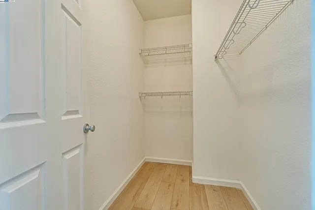 a view of small space with racks on the wall