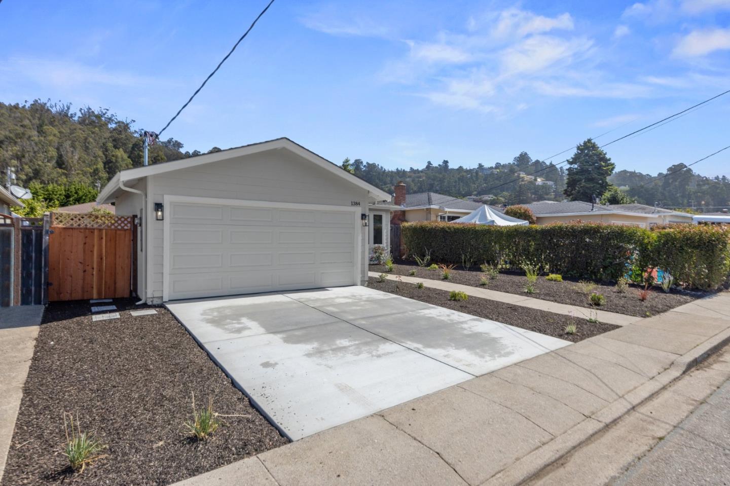 1384 Solano Drive Pacifica, CA 94044 - Photo 3 of 45 a view of a house with a yard
