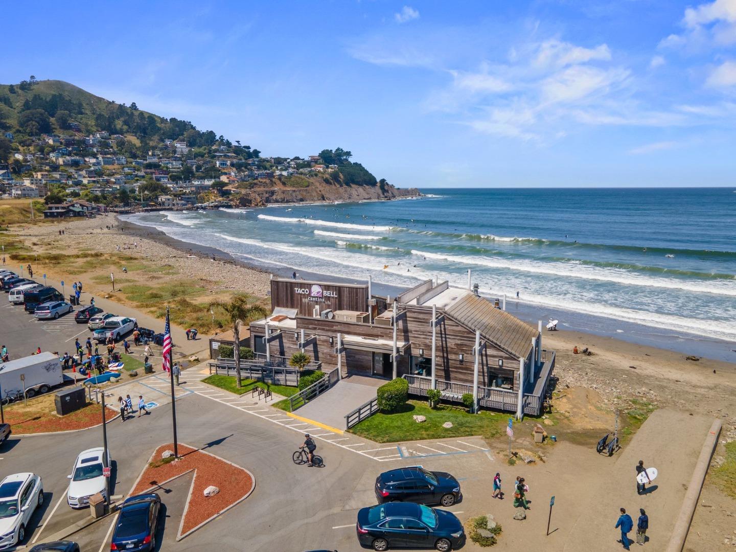 1384 Solano Drive Pacifica, CA 94044 - Photo 39 of 45 a view of an ocean with a floor to ceiling window