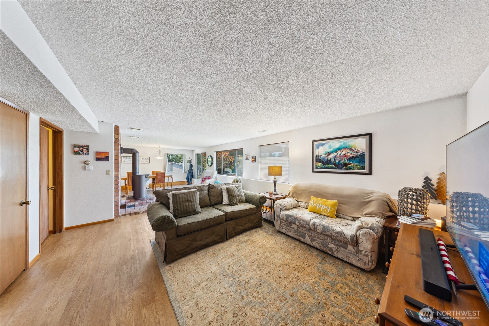 4314 Bryce Drive Anacortes, WA 98221 - Photo 17 of 40 a living room with furniture and a couch
