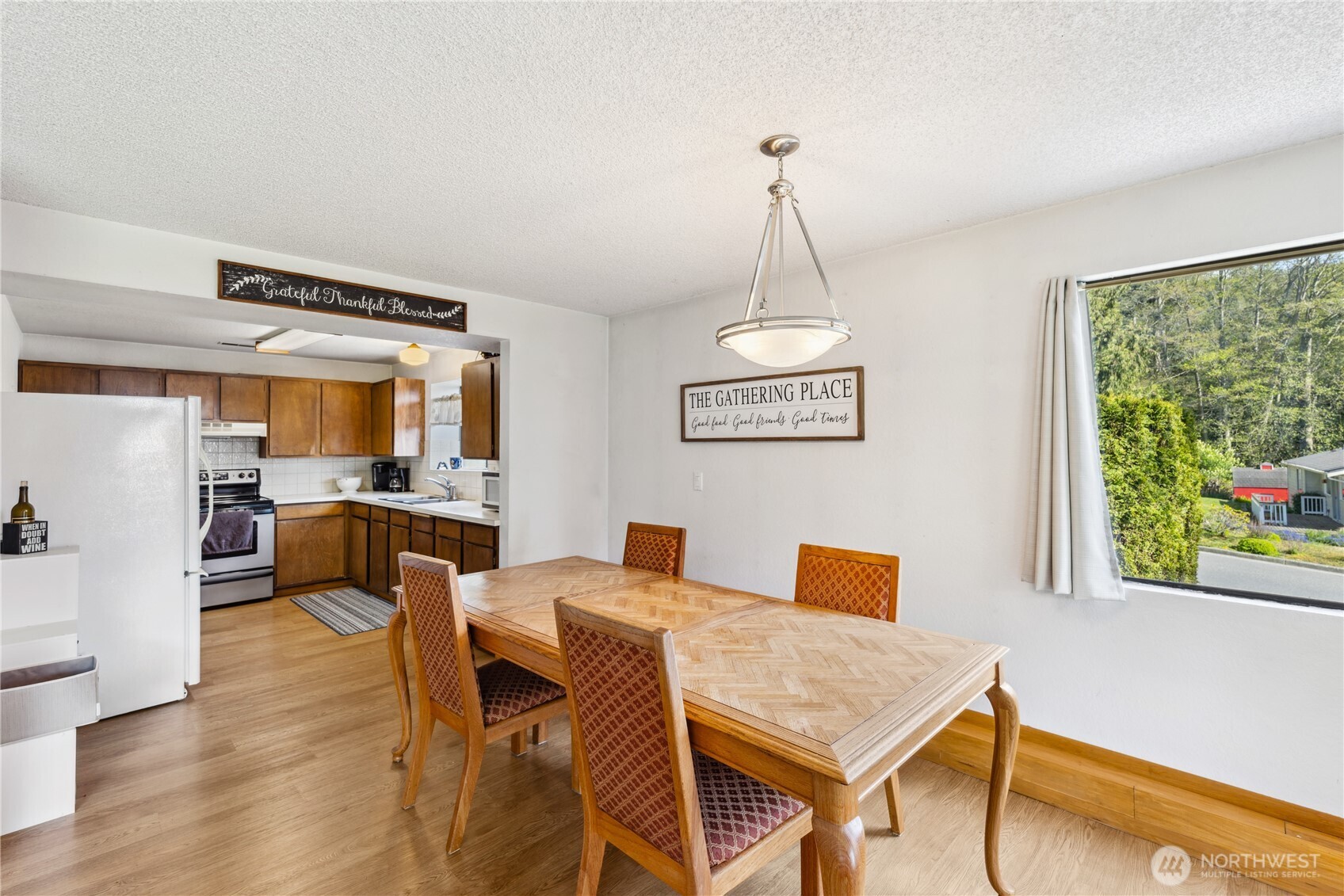 4314 Bryce Drive Anacortes, WA 98221 - Photo 21 of 40 a living room with furniture and a window