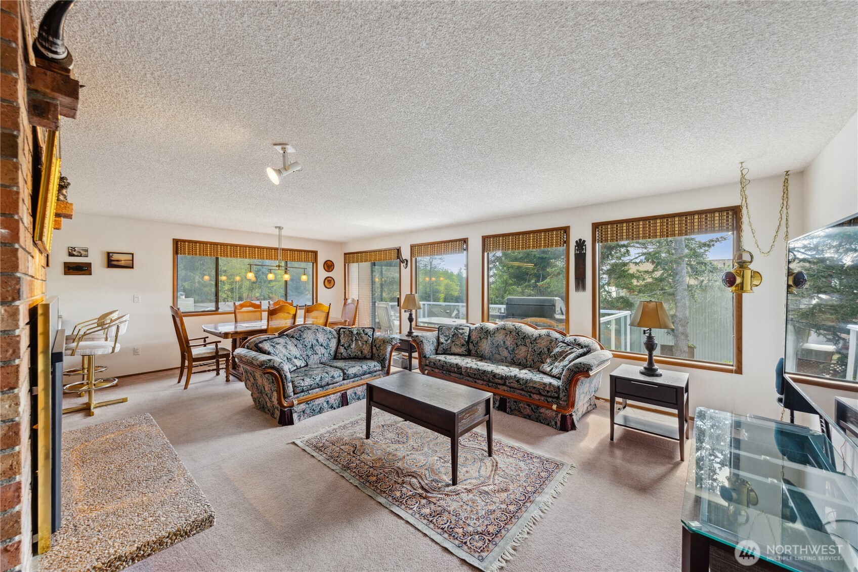 4314 Bryce Drive Anacortes, WA 98221 - Photo 4 of 40 a living room with furniture and a large window