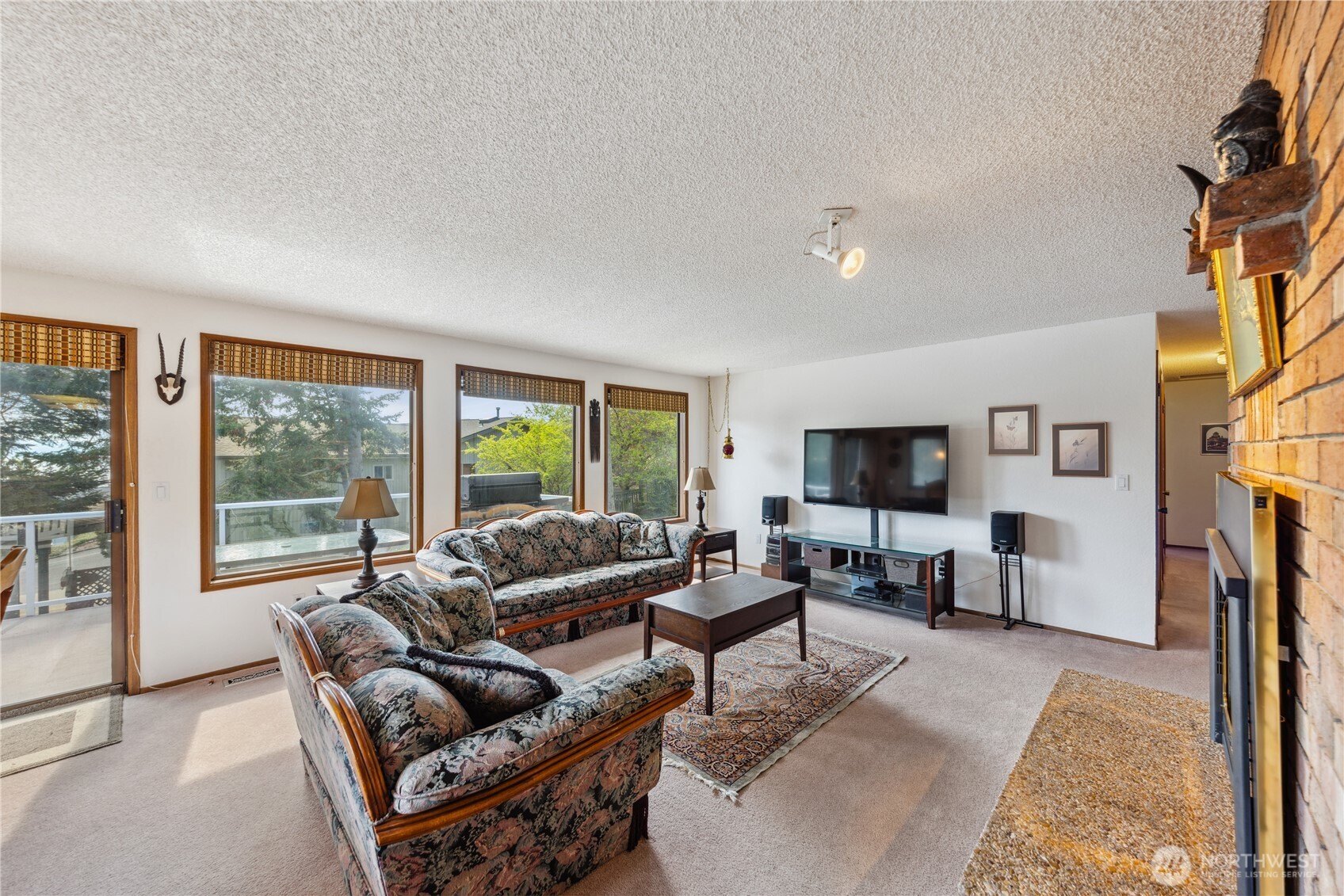 4314 Bryce Drive Anacortes, WA 98221 - Photo 6 of 40 a living room with furniture and a flat screen tv