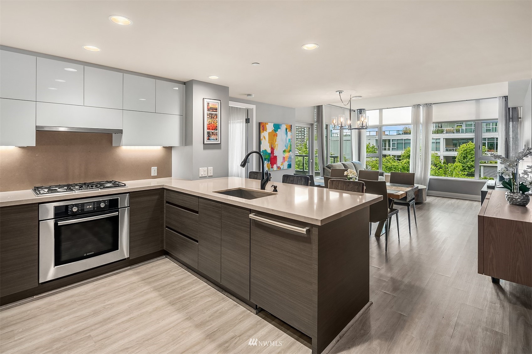 588 Bell Street, Unit 814S Seattle, WA 98121 - Photo 1 of 37 a kitchen with stainless steel appliances granite countertop a stove and a refrigerator