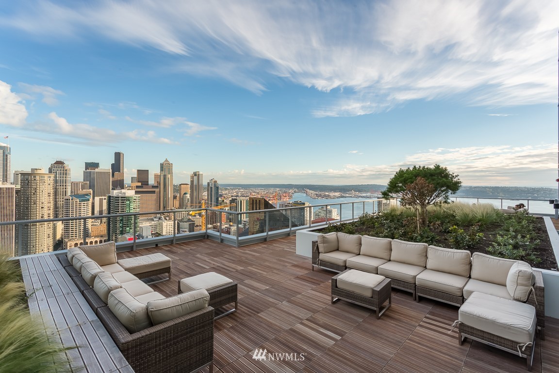 588 Bell Street, Unit 814S Seattle, WA 98121 - Photo 33 of 37 a terrace view with seating space barbeque oven and outdoor seating
