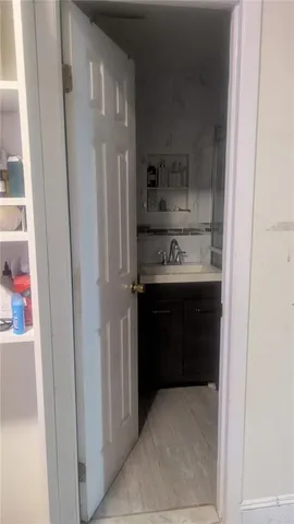 a kitchen with stainless steel appliances a refrigerator and a sink