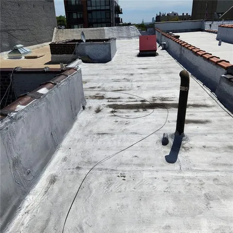 a view of a building with a swimming pool