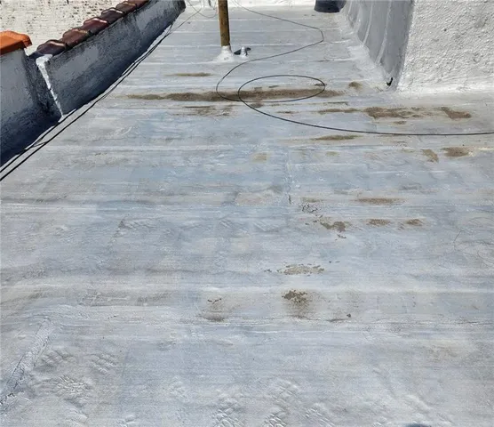 a view of a brick building with a large windows