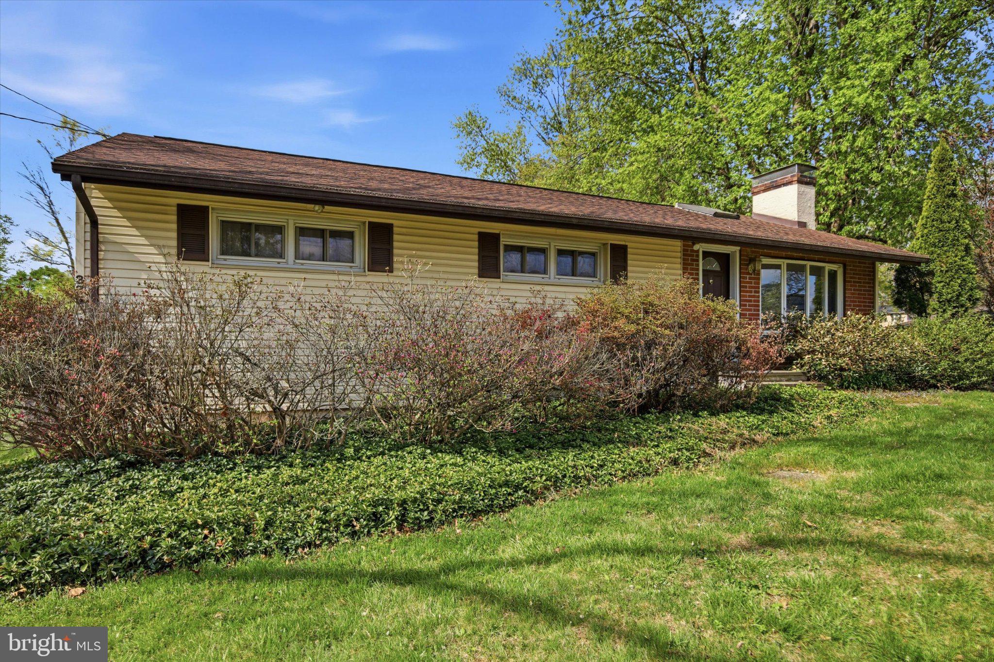 3386 Bristol Road Chalfont, PA 18914 - Photo 2 of 35 Charming home with lush greenery.