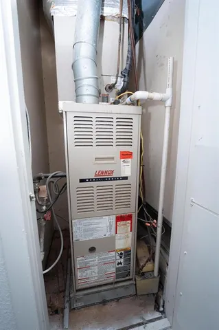 a bathroom with a toilet sink and a mirror