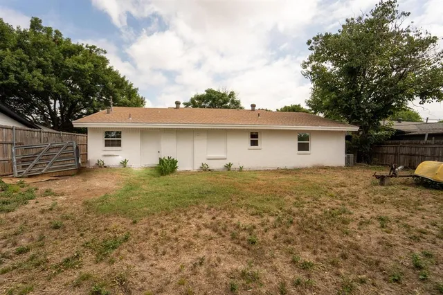 a view of backyard with green space
