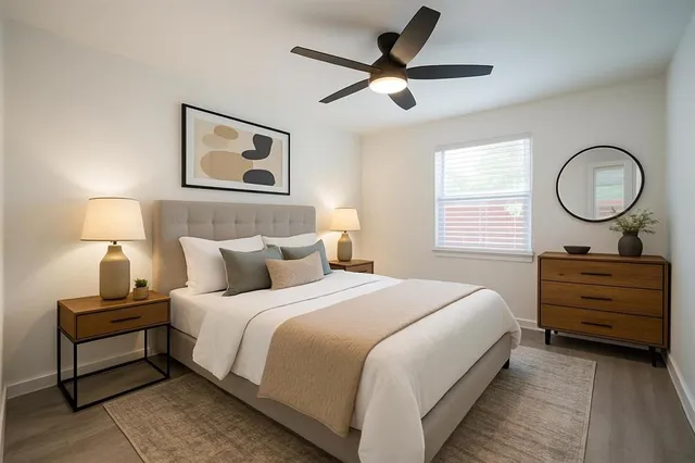 a kitchen with appliances a sink and cabinets