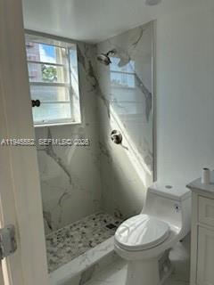 2950 Southwest 3rd Avenue, Unit 3A Miami, FL 33129 - Photo 7 of 11 a bathroom with a toilet and a shower