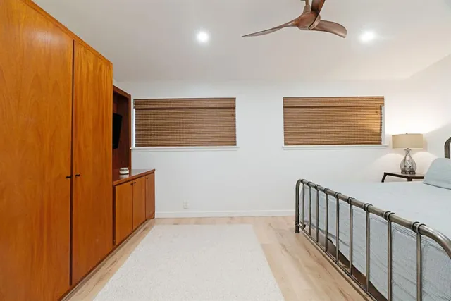 a view of a hallway with entryway door