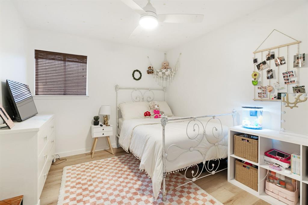 3350 Robin Road Paris, TX 75460 - Photo 14 of 21 a bedroom with a bed and a couch