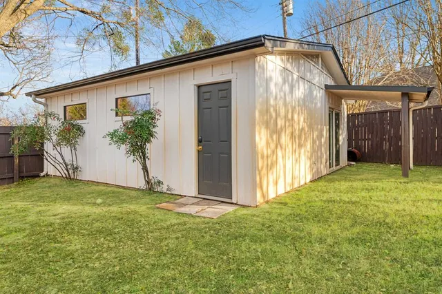 a front view of house with a yard