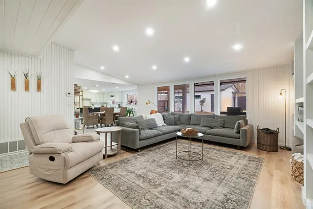 a living room with furniture and a couch