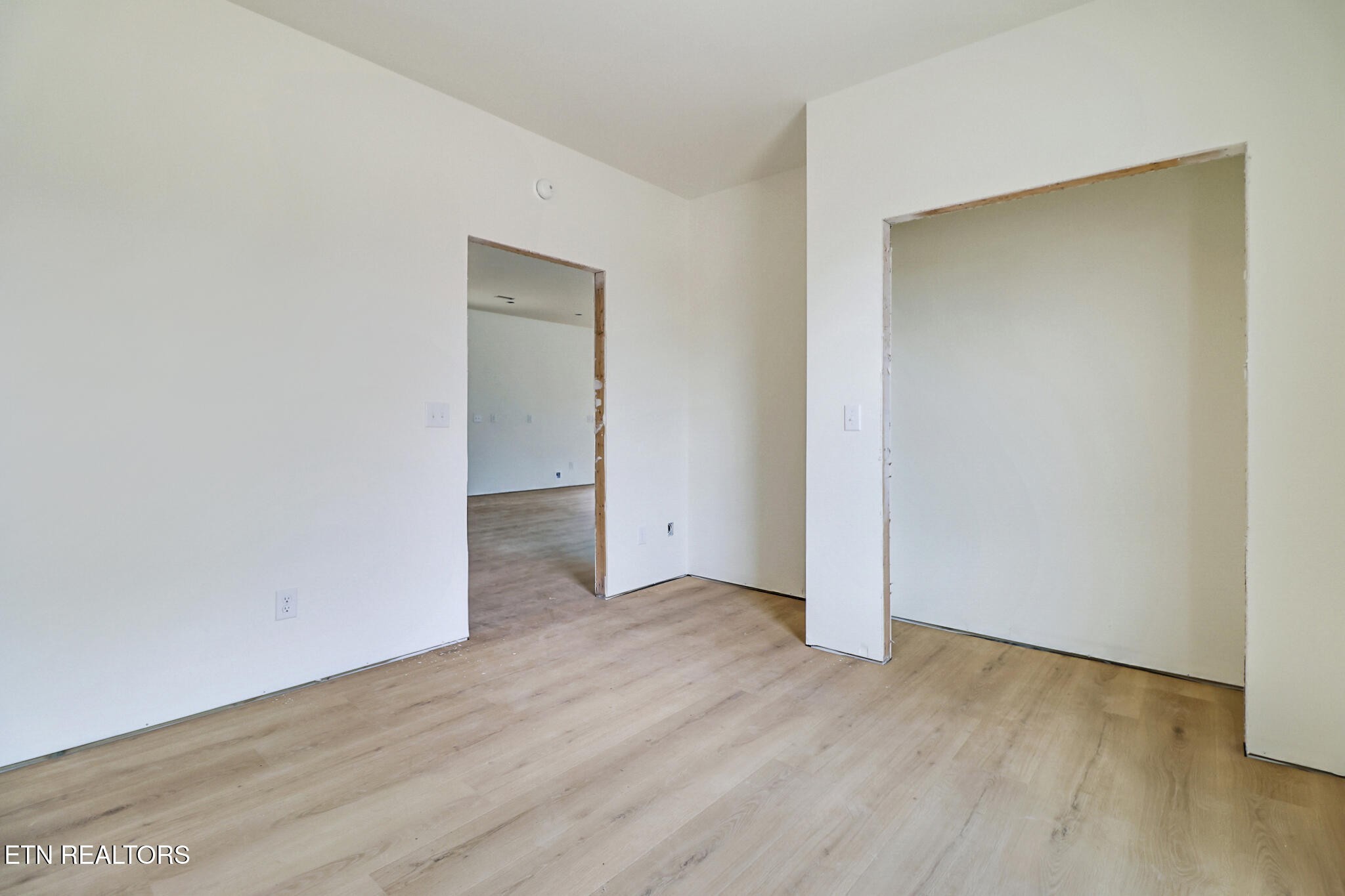 1468 Taylor Place Road Jamestown, TN 38556 - Photo 13 of 27 an empty room with wooden floor and closet