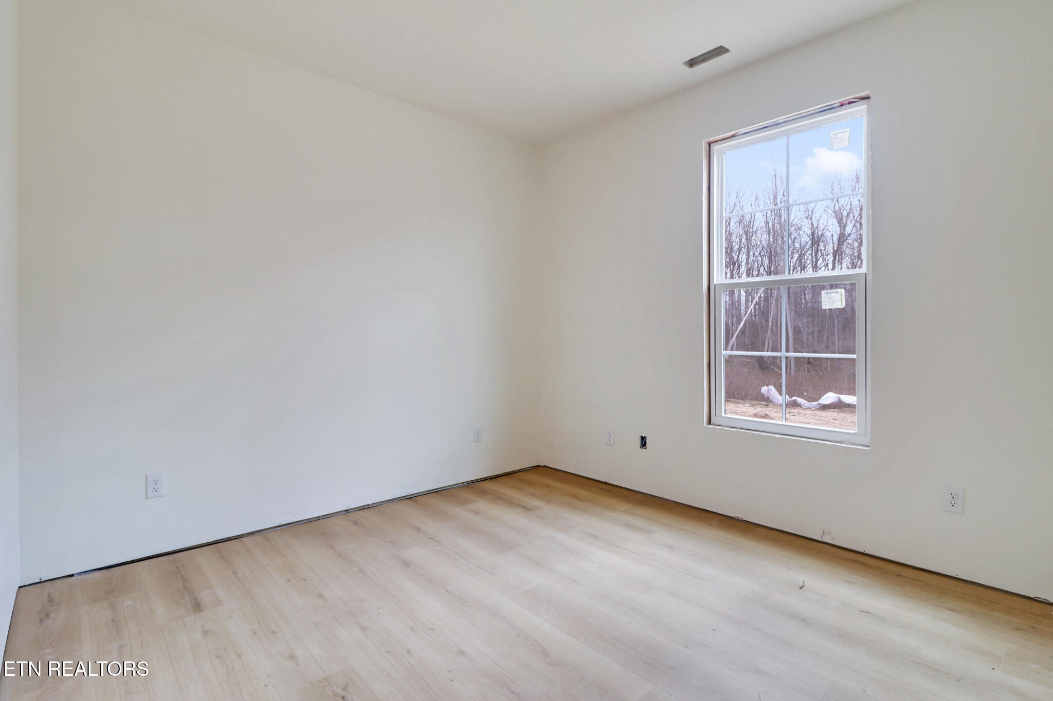 1468 Taylor Place Road Jamestown, TN 38556 - Photo 16 of 27 an empty room with a window