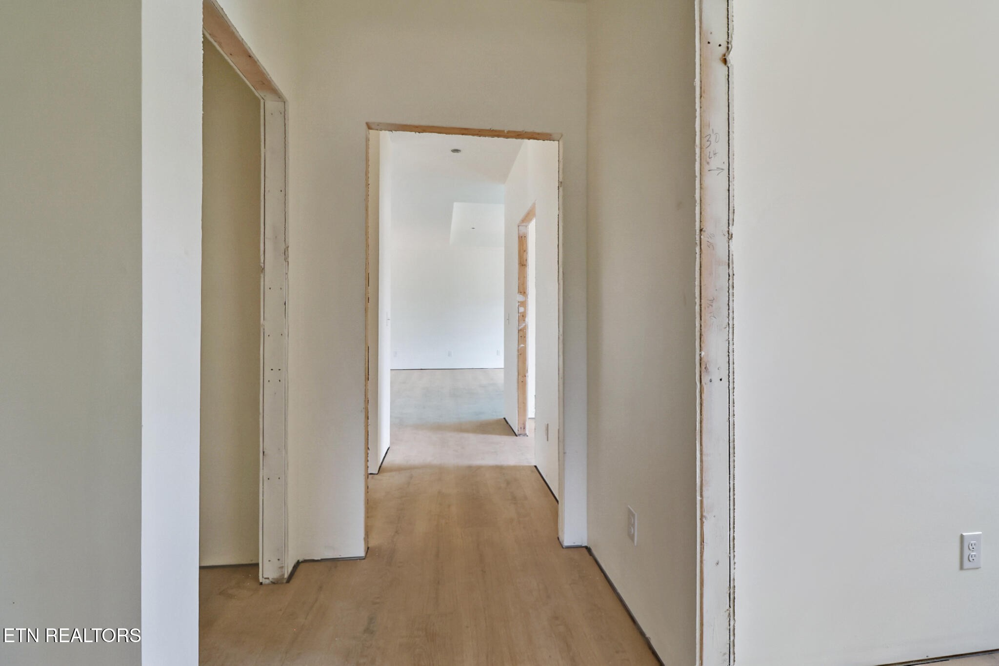 1468 Taylor Place Road Jamestown, TN 38556 - Photo 19 of 27 a view of a hallway with wooden floor