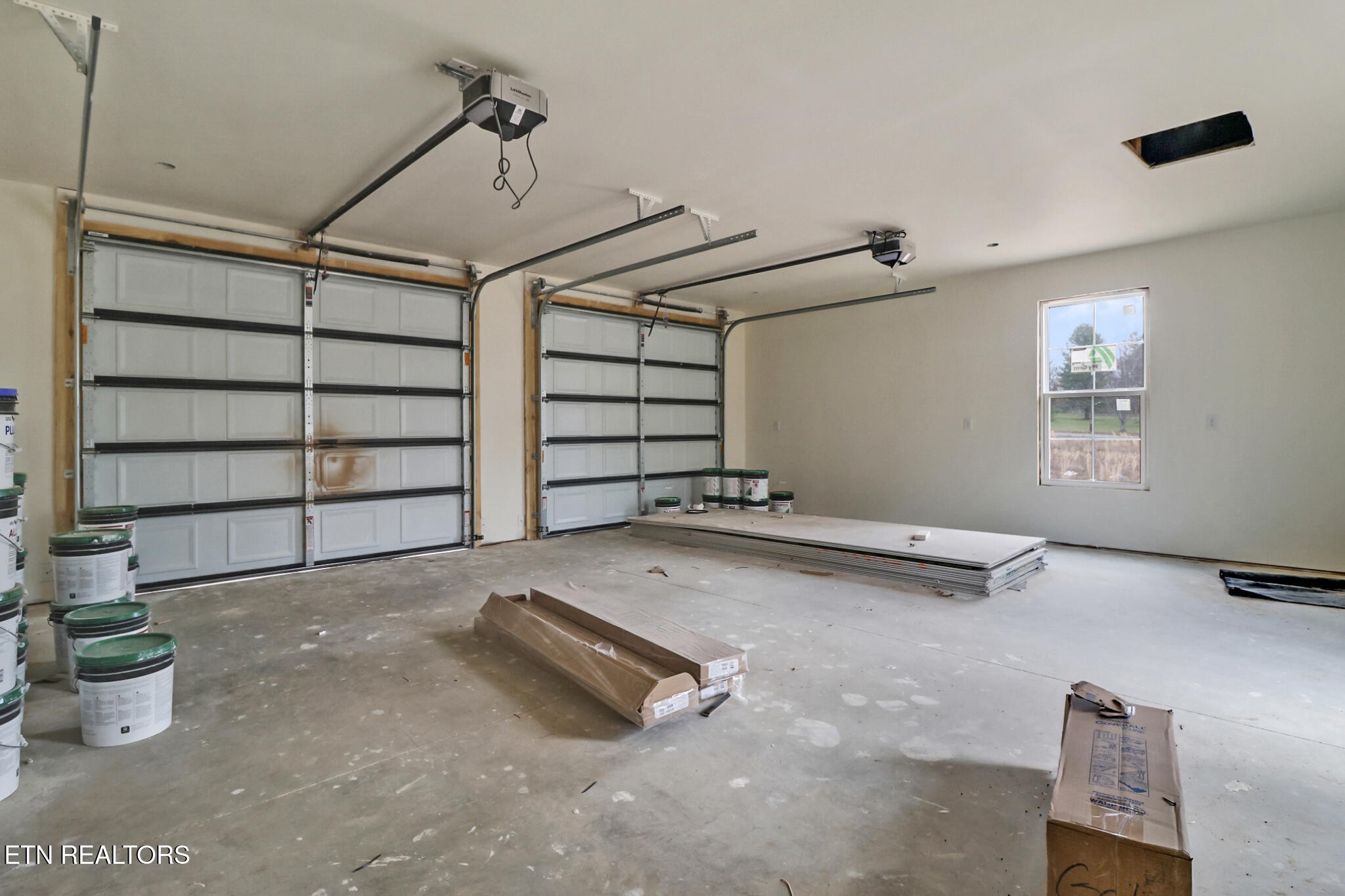 1468 Taylor Place Road Jamestown, TN 38556 - Photo 22 of 27 a view of a room with gym equipment and a window