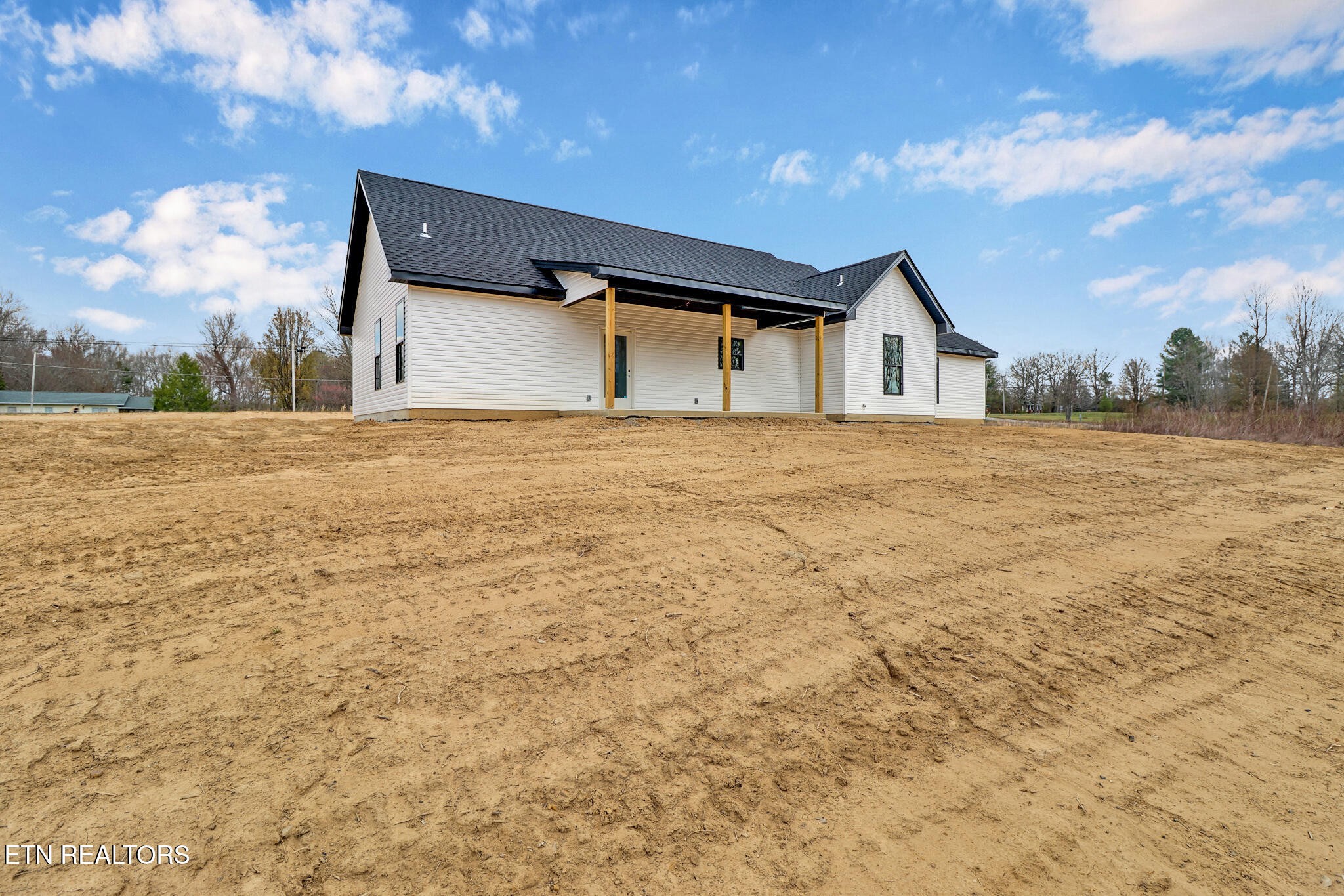 1468 Taylor Place Road Jamestown, TN 38556 - Photo 24 of 27 a house with yard and mountain view
