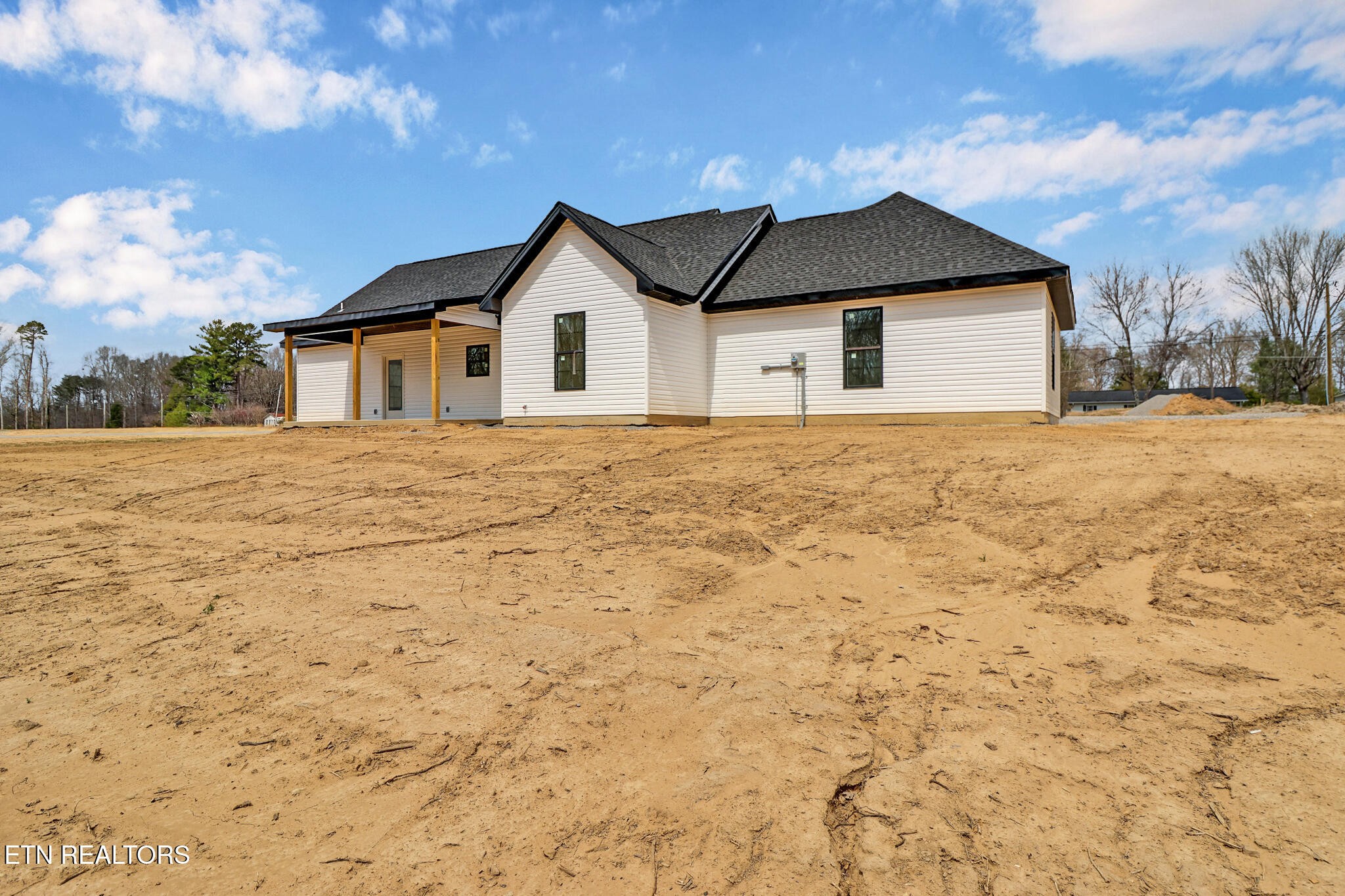 1468 Taylor Place Road Jamestown, TN 38556 - Photo 25 of 27 a house with yard covered with wooden fence