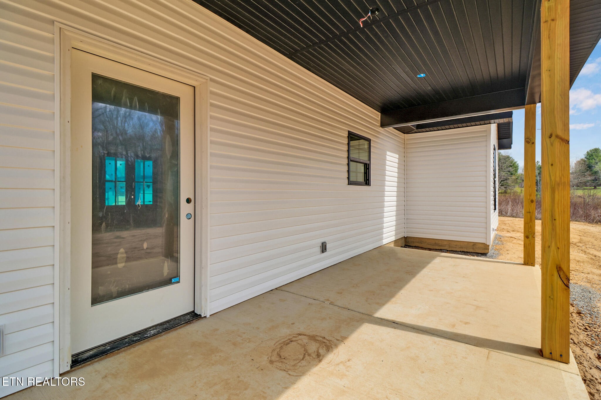 1468 Taylor Place Road Jamestown, TN 38556 - Photo 5 of 27 a view of a porch with a door