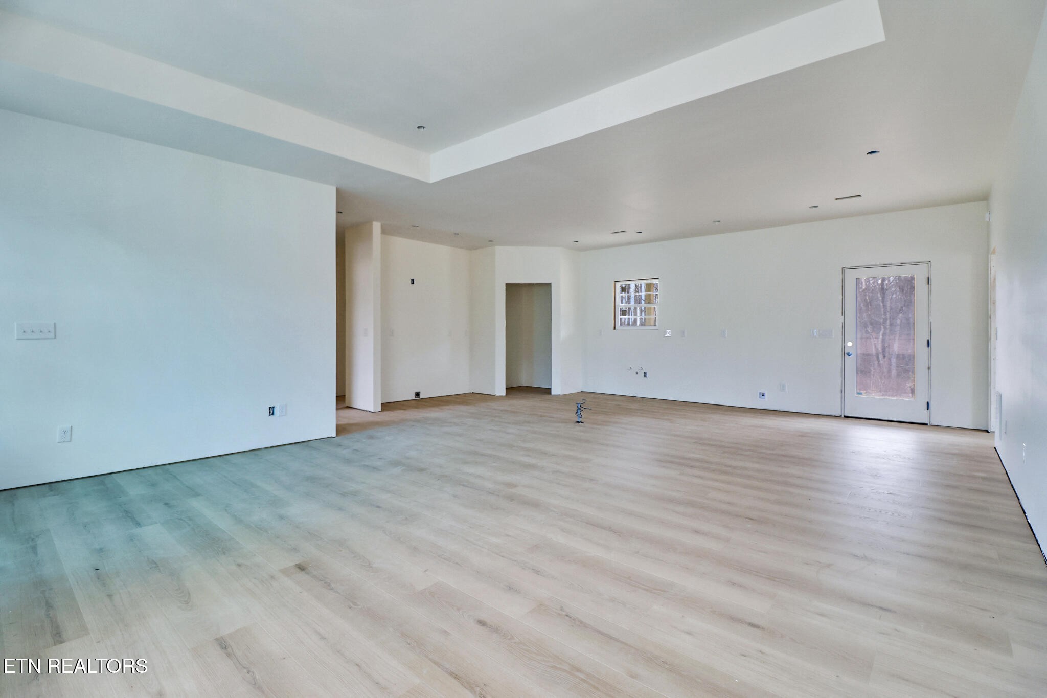 1468 Taylor Place Road Jamestown, TN 38556 - Photo 8 of 27 an empty room with wooden floor