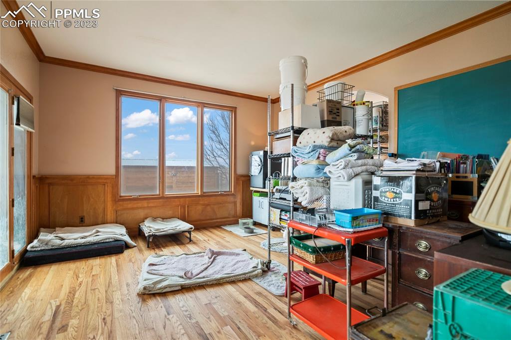 20880 Scott Road Calhan, CO 80808 - Photo 22 of 39 a bedroom with furniture and a large window