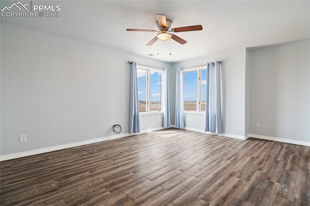 20880 Scott Road Calhan, CO 80808 - Photo 27 of 39 a view of an empty room with a window