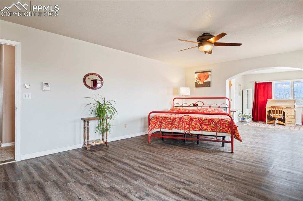 20880 Scott Road Calhan, CO 80808 - Photo 30 of 39 a bedroom with a bed and a table