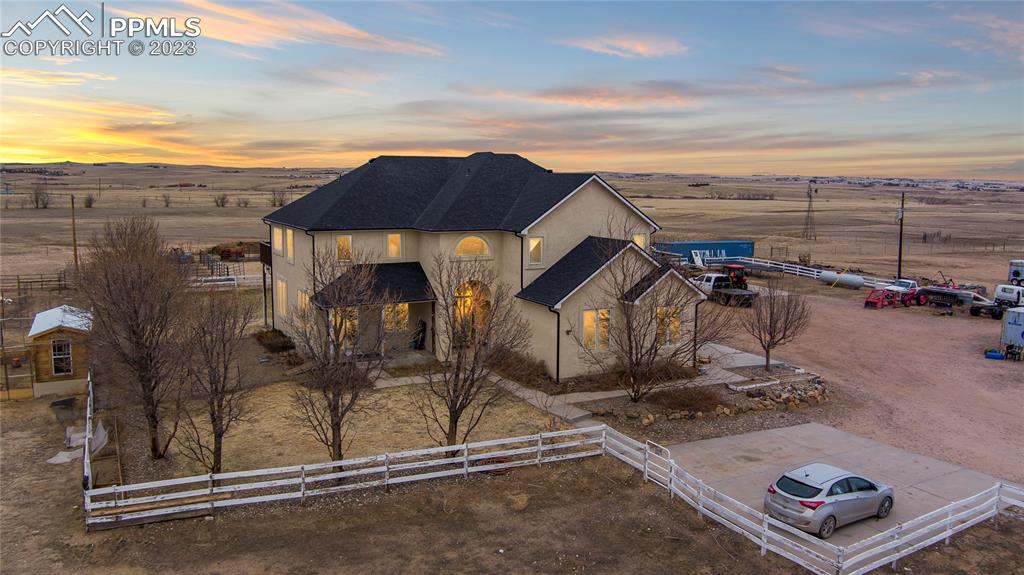 20880 Scott Road Calhan, CO 80808 - Photo 3 of 39 a view of a house with a yard