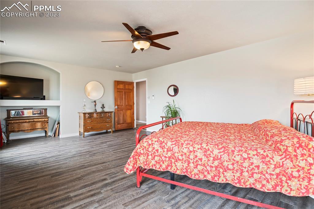 20880 Scott Road Calhan, CO 80808 - Photo 34 of 39 a bedroom with a bed and dresser