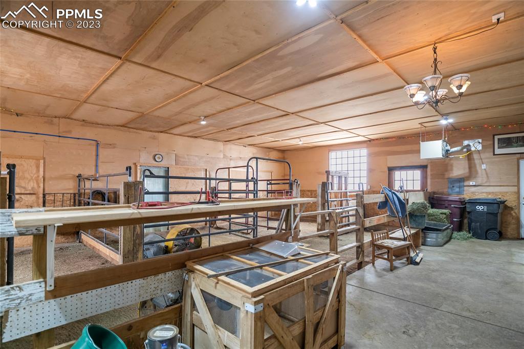 20880 Scott Road Calhan, CO 80808 - Photo 35 of 39 a view of a chairs and table in a room
