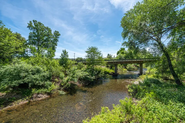 a view of a lake with a outdoor space