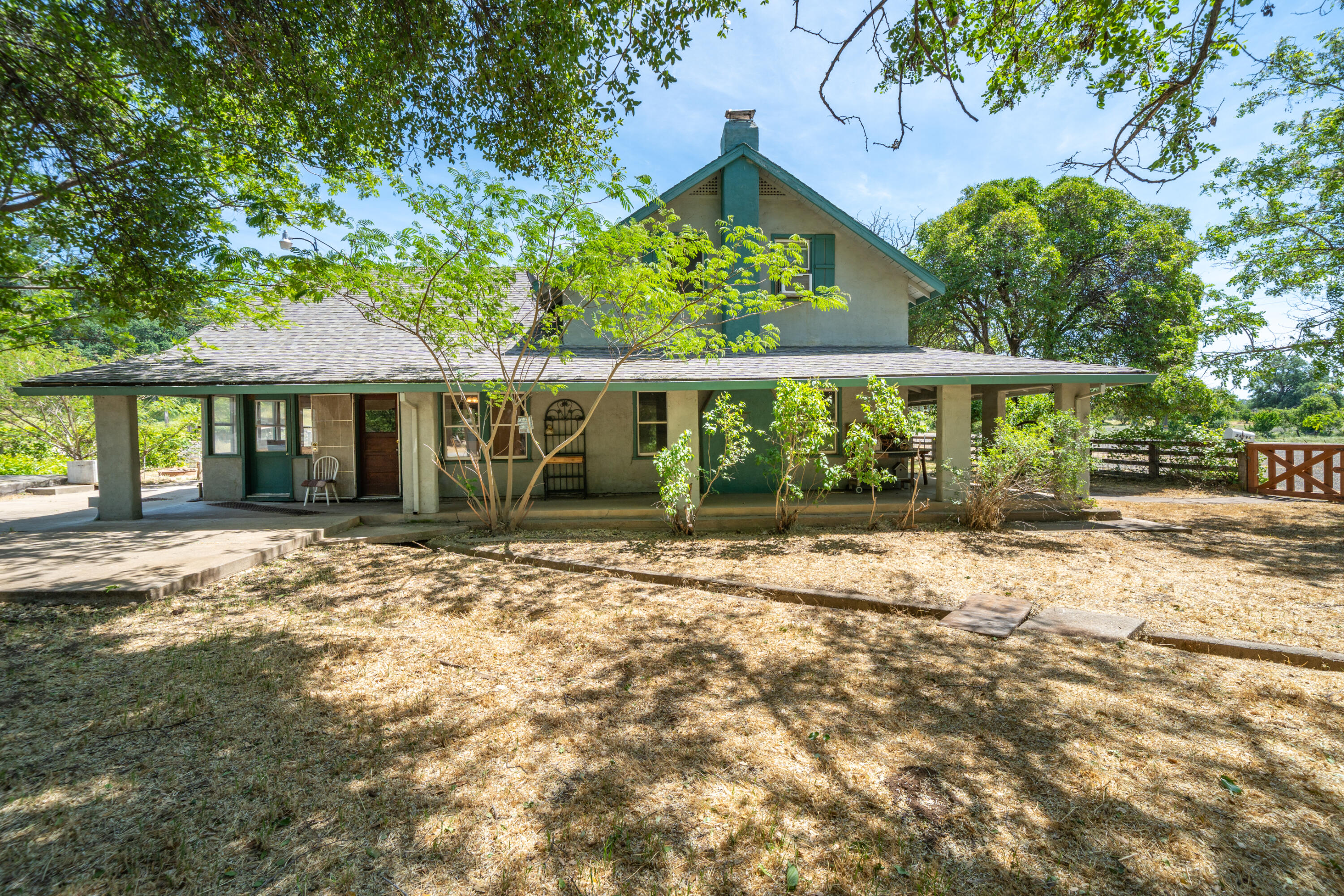 24294 Dersch Road Shingletown, CA 96088 - Photo 2 of 34 a house with a garden view