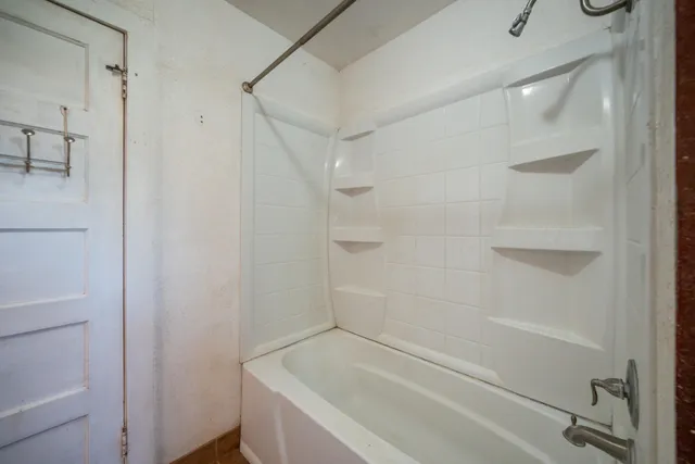 a bathroom with a bathtub